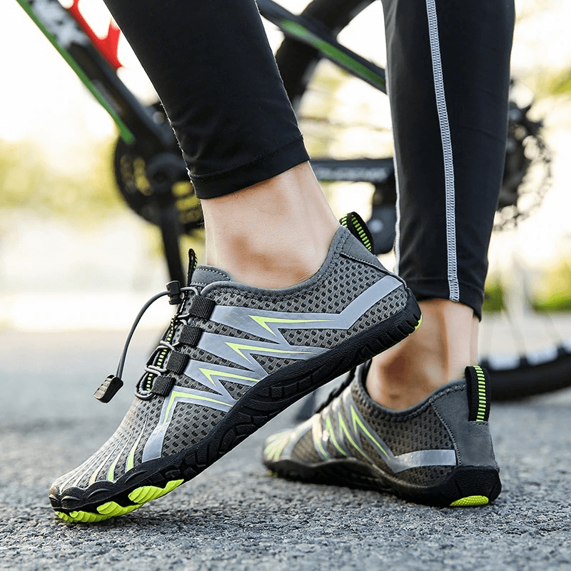 Person wearing Drainage Antiskid Sole Sports Breathable Shoes for Swimming, showcasing stretch fabric and anti-skid rubber outsole.